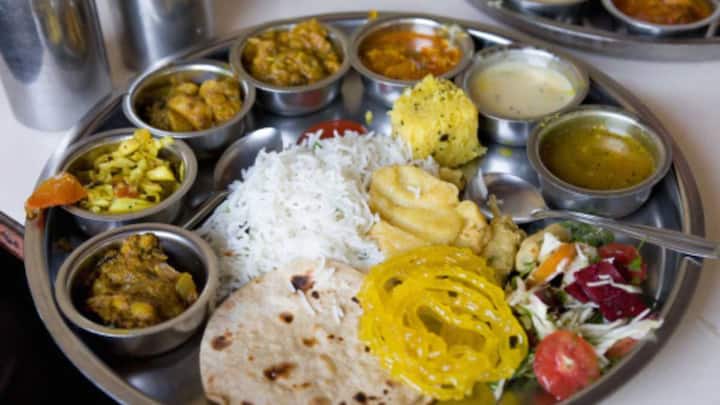 Home Made Veg Thali Becomes Costlier In April On Surging Onion Tomato Potato Prices CRISIL Homemade Veg Thali Was Costlier, Non-Veg Cheaper This April Compared To 2023: CRISIL Report