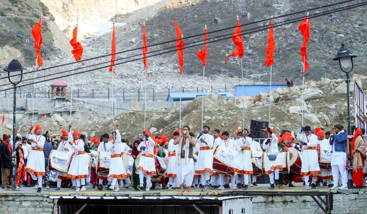Artists perform during opening of portals of the Kedarnath Temple for devotees, marking the start of the 'Char Dham Yatra', in Rudraprayag district (Image Source: PTI)