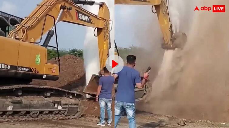 The digging machine jumps into the air due to the pressure of water which gives an idea of ​​the power of water Video: पानी ने दिखाई अपनी ताकत...हाइड्रोलिक मशीन को हवा में उछाला, देखें खतरनाक वीडियो