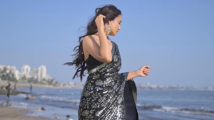 Surbhi Jyoti raised the temperature with a black-silver saree look on Instagram.