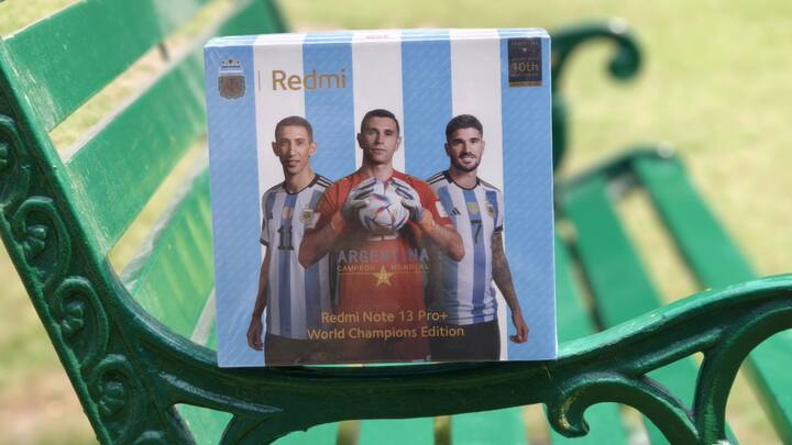 Make No Mistake, This IS A Special Edition: The Redmi Note 13 Pro World Champions Edition comes in a special gift box that pretty much tells you what the phone is about. The box features three members of Argentina's World Cup winning squad - Ángel Di María, Rodrigo De Paul, and one of the stars of the final, goalkeeper Emiliano Martinez - with the famous blue and white striped pattern of Argentina's football jersey in the background, the words