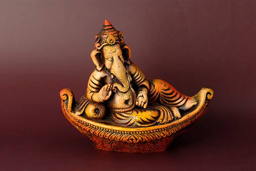 6. The Single Tusk: Ganesha's single tusk represents retaining the good but throwing away the redundant or bad, a spiritual call for discernment in life. It teaches the importance of evaluating experiences and retaining only what contributes positively to spiritual growth. (Image Source: Getty)