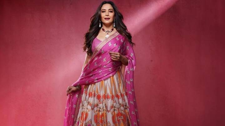 Check out Madhuri Dixit's fresh look in a vibrant lehenga.