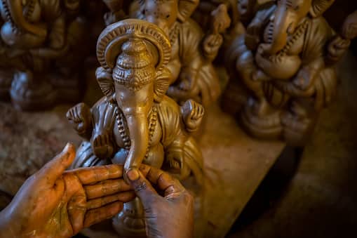 4. The Mouse - His Vehicle: The mouse, Ganesha's chosen vehicle, symbolises the ego, a creature who despite its minute size can gnaw through every barrier. The mouse's ability to nibble steadily at ropes represents the persistent quality of the mind to break down even the most robust barriers between the devotee and the divine. (Image Source: Getty)