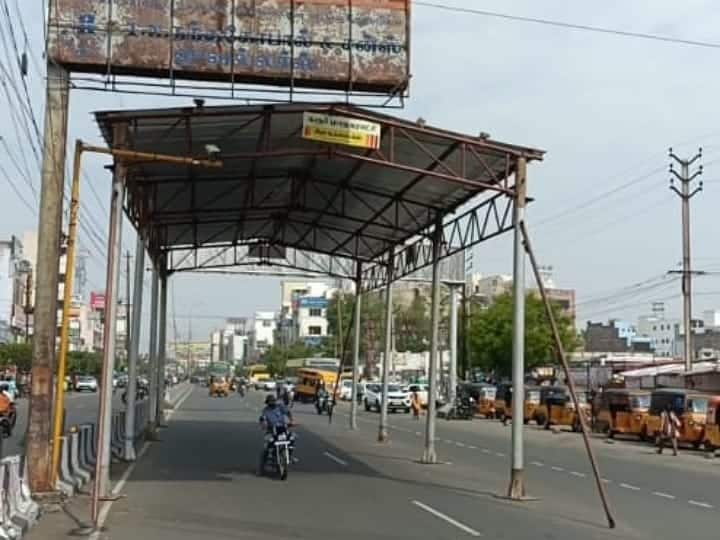 Karur news tin shade for the welfare of two-wheeler riders - TNN வெயிலில் இருந்து கொஞ்ச நேரம் விடுதலை; கரூரில் வாகன ஓட்டிகளுக்காக அமைக்கப்பட்ட நிழல் குடை