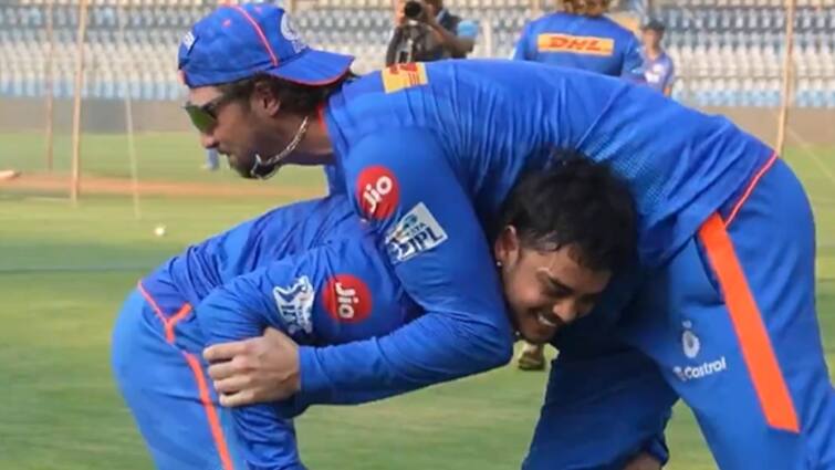 Ishan Kishan and Tim David did wrestling in cricket filed Watch video IPL 2024 Mumbai Indians IPL 2024 Watch: क्रिकेट का मैदान बना कुश्ती का अखाड़ा, ईशान किशन और टिम डेविड ने किए दो-दो हाथ; देखें वीडियो