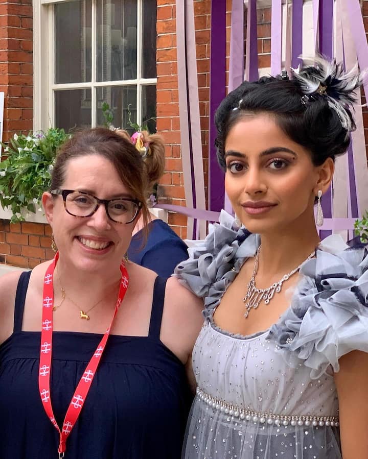 In the photos she shared, she is dressed in stunning Victorian outfits and poses with some of her castmates.