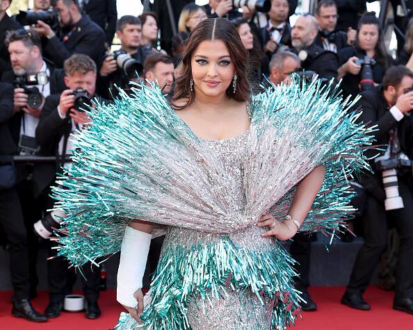 Aishwarya wore a dazzling blue and silver gown with a long trail by Falguni Shane Peacock. The designer duo also styled Aishwarya's Day 1outfit.