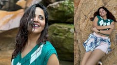 Anasuya Bharadwaj Vacation Photos : అడవిలో అనసూయ.. గుట్టులు.. నీటి గుంటల్లో ఆడుకుంటూ