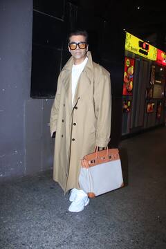 मोठा चष्मा आणि लांब कोट घालून करण जोहर दिसला विमानतळावर, चित्रपट निर्मात्याची स्टाईल झाली व्हायरल!