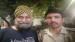 'Taarak Mehta' Actor Gurucharan Singh Returns Home After 26 Days, Poses With Police Officer In First PIC