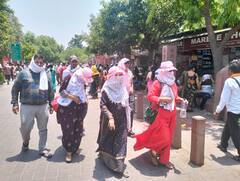 IN Pics: ताजनगरी में 46.9 डिग्री पहुंचा पारा, चिलचिलाती गर्मी से परेशान हुए पर्यटक, देखें तस्वीरें