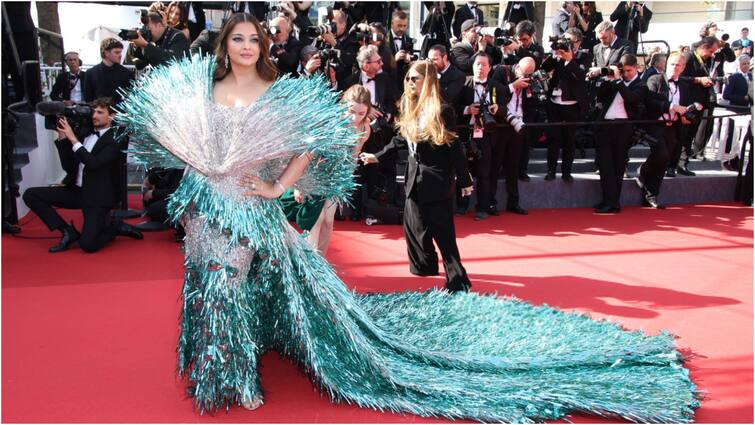 Aishwarya Rai Bachchan second look at Cannes gets mixed response Aishwarya Rai Bachchan: డెకరేషన్ ఐటెమ్స్‌తో డ్రెస్ కుట్టించారా? ఐశ్వర్య రాయ్ కేన్స్ లుక్‌పై విమర్శలు