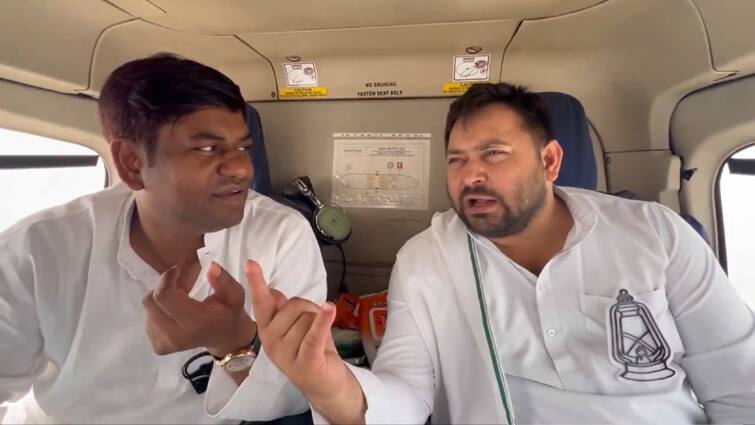 Bihar RJD Leader Tejashwi Yadav and Mukesh Sahani talking Video in helicopter during lok sabha elections 2024 ANN Watch: हेलीकॉप्टर पर फिर साथ दिखे तेजस्वी यादव मुकेश सहनी, पीएम मोदी के बारे में ये कह रहे दोनों? खुद सुनिए