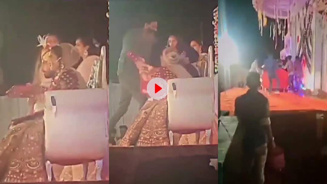 man beat groom During the wedding ceremony climbed the stage and started beating in front of bride Video: स्टेज पर बैठे दूल्हे पर दुल्हन के सामने शख्स ने बरसाए कई घूसे, शादी में कलेश का वीडियो हो रहा वायरल