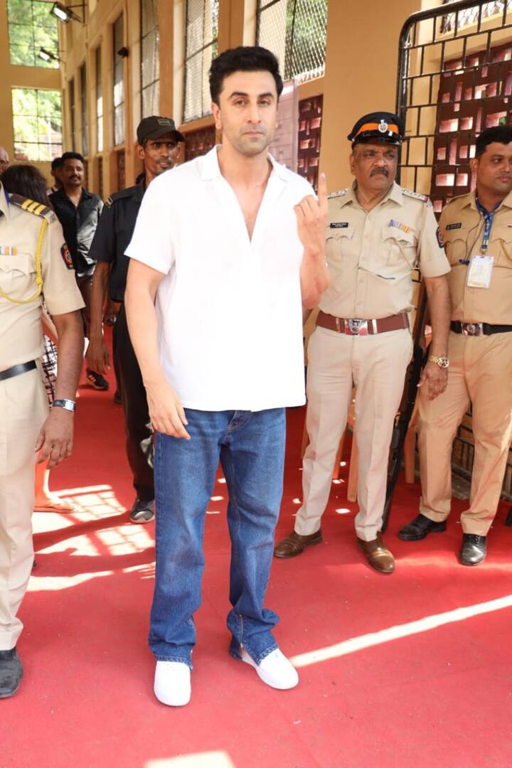 Ranbir was dressed in a white shirt and blue jeans with white sneakers.