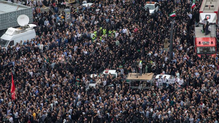 Iranians gathered at Valiasr Square in central Tehran on Monday to mourn President Ebrahim Raisi, who died in a helicopter crash on Sunday.  (Photo: Getty)