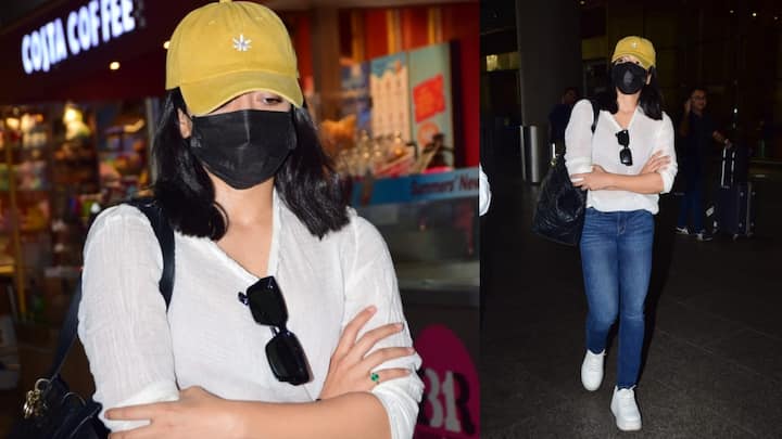 Rashmika Mandanna Photos : హీరోయిన్ రష్మిక మందన్న ఫోటోలు ప్రస్తుతం సోషల్ మీడియాలో వైరల్ అవుతున్నాయి. ఎయిర్​పోర్ట్​కి వెళ్లిన హీరోయిన్ మాస్క్ పెట్టుకున్నా.. కెమెరా కంటికి మాత్రం దొరికిపోయింది.