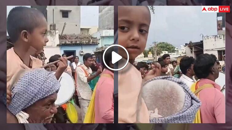 grandfather and grandson love video get viral Sitting on the shoulders and playing drum on his head Trending Video: बूढ़े दादा के कंधे पर बैठकर सिर को ढोल की तरह बजाता रहा पोता, लोग बोले- ये होता है सच्चा प्यार