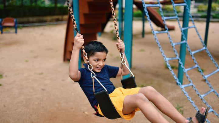 Create Outdoor Play Spaces: Design outdoor play spaces in your backyard or community that are conducive to active play and exploration. Install play equipment like swings, slides, and climbing. structures, or a sandbox to encourage physical activity and imaginative play. Incorporate natural elements such as trees, rocks, and plants to stimulate sensory experiences and foster a deeper connection with nature. A well-designed outdoor play area provides endless opportunities for adventure and discovery. (Image source: getty images)