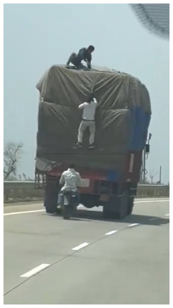 चलते ट्रक से उड़ा लिया सामान, वीडियो वायरल