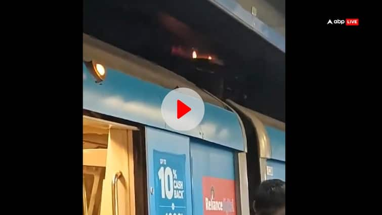 Delhi Metro fire viral video on social media DMRC reaction राजीव चौक स्टेशन पर मेट्रो ट्रेन की छत पर दिखी आग की लपटें, वायरल वीडियो पर क्या बोली DMRC?