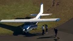 Plane Crash Lands At Sydney Airport After Flying Low Over Residential Buildings — WATCH