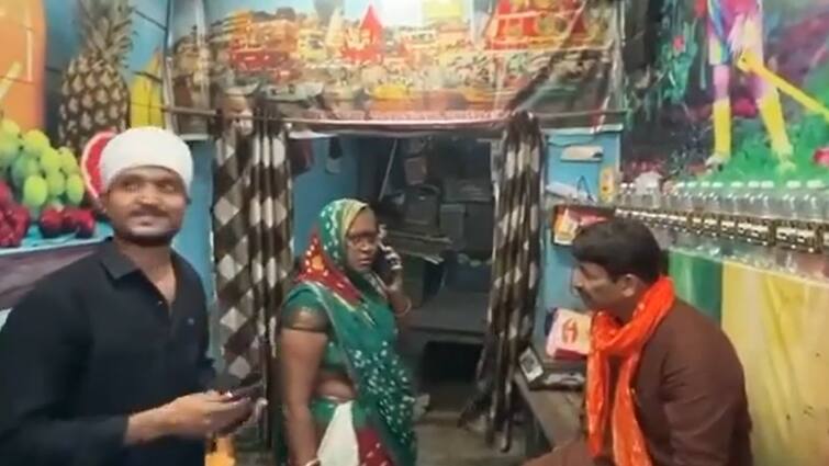 Woman holds BJP MP Manoj Tiwari hostage in Varanasi watch video वाराणसी में महिला ने BJP सांसद मनोज तिवारी को बनाया बंधक, देखें Video