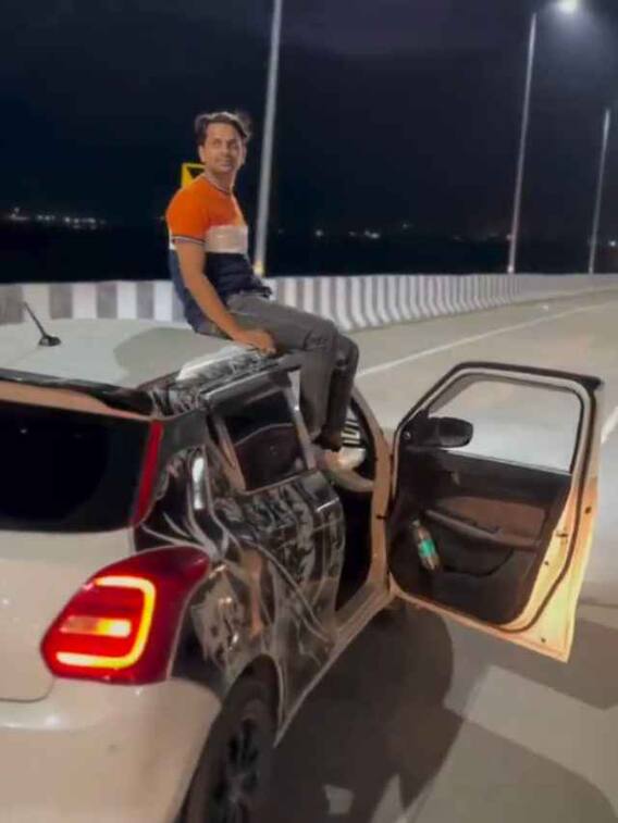 चलती गाड़ी पर दिखाया स्टंट...सोशल मीडिया पर हो रहा वायरल