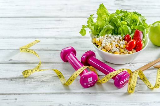 5. Maintain a Healthy Weight: Losing excess weight can help lower cholesterol levels, especially if you have extra pounds around your middle. (Image Source: Getty)