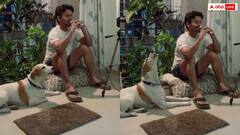 कुत्ते पर सवार सिंगिंग का खुमार....शख्स के सुर से मिलाए सुर, देखने वाले रह गए हैरान