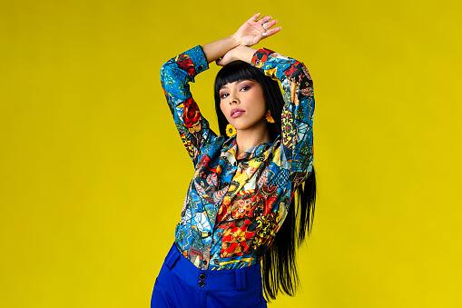 Colour is an excellent way to express your individuality. Do you possess a vivid and daring personality? A fiery red should be tried then! Feeling playful, go for a sunshine yellow! By incorporating vibrant colours into your wardrobe, you're not just dressing your body, you're telling the world a story about yourself. (Image Source: Getty)