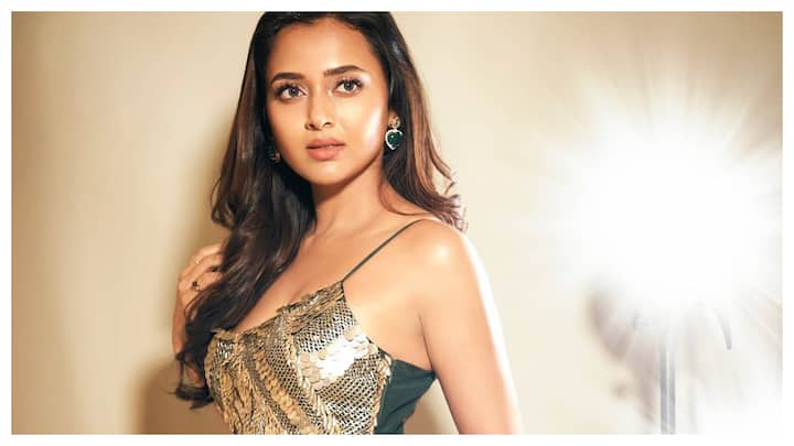 On Wednesday, Tejasswi Prakash took to Instagram and shared a series of pictures in a green and golden dress.