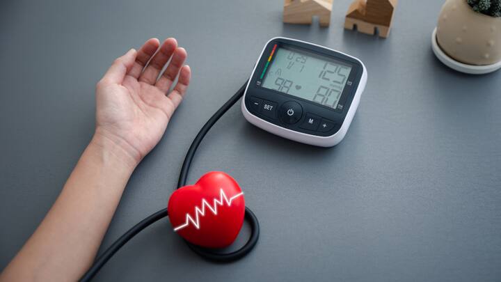 Monitor blood pressure and cholesterol: Keeping a regular check on blood pressure levels and getting your cholesterol checked every 3 months will keep you updated about any abnormalities, and you can visit your healthcare provider immediately for the correct treatment. (Image Source: Canva)