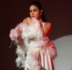 Sara Ali Khan Stuns In White Thigh-High Slit Gown With Feather Sleeves - See Pics