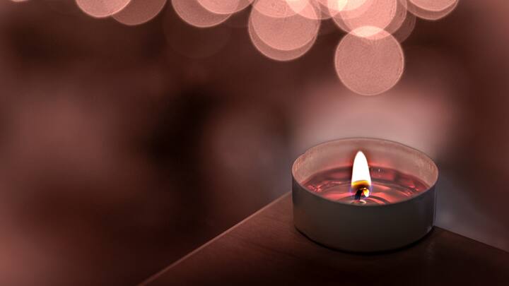 6. Outdoor Ambiance: Candles aren’t just for indoor spaces. Use them to enhance your outdoor living areas, such as patios or gardens. Citronella candles can double as decor and insect repellent, providing both beauty and function. (Image Source: Canva)