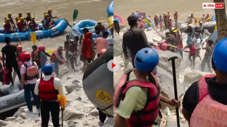 fierce kicking and punching between the people and sailors who came for rafting in the river Ganga Video viral Video: ऋषिकेश में राफ्टिंग स्टाफ की ये लड़ाई हो रही है वायरल, चप्पू से कर रहे एक दूसरे की पिटाई