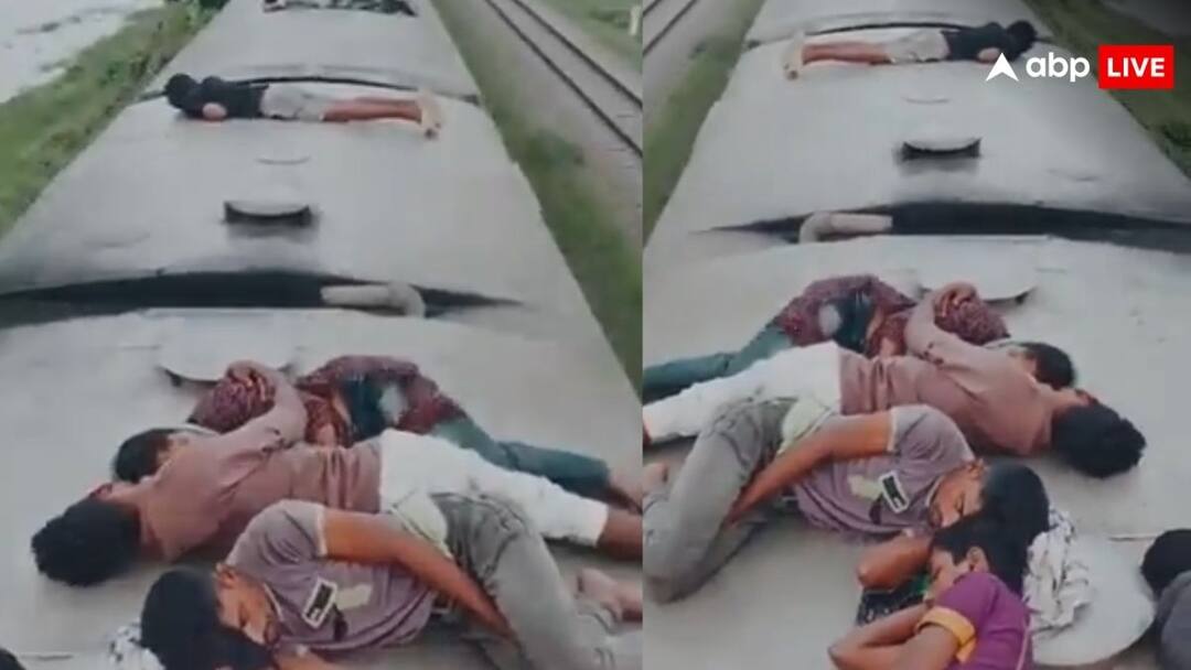 चलती ट्रेन की छत पर सोते नजर आए लोग, वीडियो हो रहा है वायरल people seen sleeping on the roof of train video goes viral on social media चलती ट्रेन की छत पर सोते नजर आए लोग, वीडियो हो रहा है वायरल