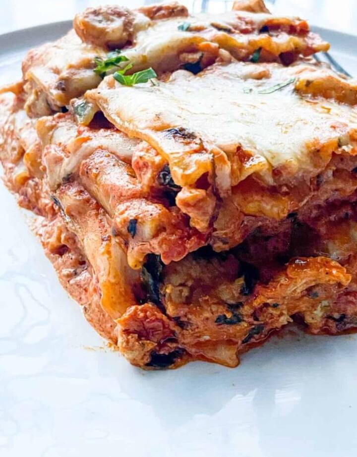 Butter Chicken Lasagna: This dish blends Italian and Indian culinary traditions. It features Delhi-style shredded chargrilled chicken tossed in a rich cashew-based onion tomato gravy, perfectly spiced. The mixture is layered between pasta sheets, topped with generous amounts of shredded cheese, and baked to perfection. (Image Source: Special Arrangement)