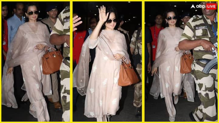 Kangna Ranaut at Airport Photos: बेबाक एक्ट्रेस कंगना रनौत हाल ही में मुंबई एयरपोर्ट पर नजर आईं. हाई-सिक्योरिटी के साथ कंगना रनौत मुंबई पहुंच गई हैं और उनकी तस्वीरें एयरपोर्ट से वायरल हो रही हैं.