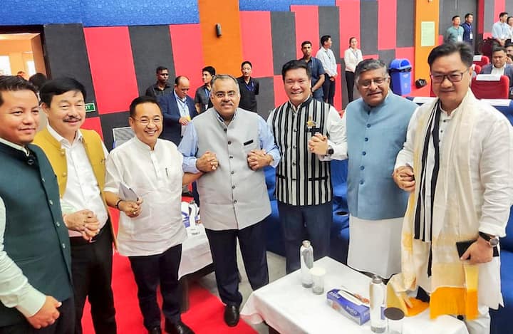 Union Minister Kiren Rijiju, Sikkim CM Prem Singh Tamang, Arunachal Pradesh CM, BJP National General Secretary Tarun Chugh, and MP Ravi Shankar Prasad during the swearing-in ceremony of Pema Khandu, in Itanagar. (Image Source: PTI)