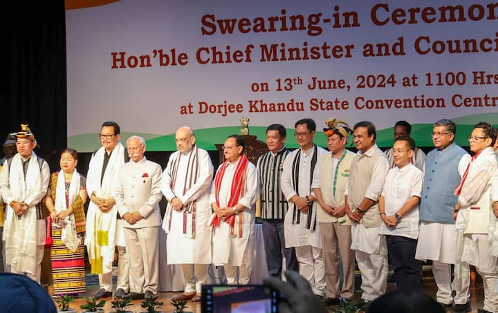 Union Ministers Amit Shah, JP Nadda, Kiren Rijiju, CM Pema Khandu, Sikkim CM Prem Singh Tamang, Assam CM Himanta Biswa Sarma, Arunachal Pradesh Governor K.T. Parnaik and BJP MP Ravi Shankar Prasad during the swearing-in ceremony of new Arunachal Pradesh government, in Itanagar. (Image Source: PTI)