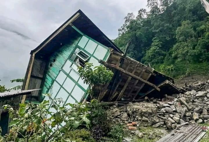 At least one person was reported dead and five others missing as massive landslides triggered by incessant rainfall caused devastation in the Mangan district. (Image Source: PTI)