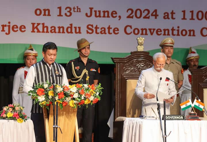 Arunachal Pradesh Governor K.T. Parnaik administers the oath of office to CM Pema Khandu during the swearing-in ceremony of the new Arunachal Pradesh government, in Itanagar. (Image Source: PTI)