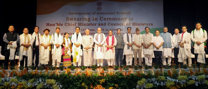 Union Ministers Amit Shah, JP Nadda, Kiren Rijiju, Arunachal Pradesh Chief Minister Khandu, Sikkim CM Prem Singh Tamang, Assam CM Himanta Biswa Sarma and BJP MP Ravi Shankar Prasad and Arunachal Pradesh Governor K.T. Parnaik during the swearing-in ceremony of new Arunachal Pradesh government, in Itanagar. (Image Source: PTI)
