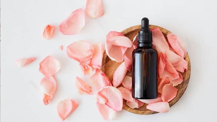 4. Test and Adjust: Put a small amount on your writs or a cotton ball and smell it. Adjust the blend by adding a few drops of any oil until you achieve the desired scent. (Image Source: Canva)