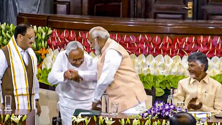 Prashant Kishor Nitish Kumar Brought Shame To Bihar Touching PM Modi Feet BJP Reacts Video Prashant Kishor Says Nitish Kumar Brought Shame To Bihar By Touching PM Modi's Feet, BJP Reacts
