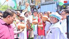 मटका फोड़ प्रदर्शन से लेकर डिब्बों की कतारों तक... तस्वीरों में देखें दिल्ली में कैसे गहराया जल संकट