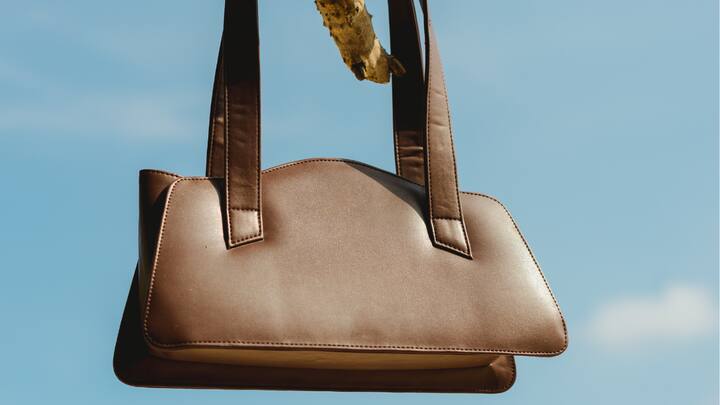 Sustainable Fashion: How to Take Care of Your Vegan Handbag Your vegan handbag will continue to look great for many years if you take care of it. The majority of vegan leather may be cleaned with a mild washing solution and a moist cloth. For detailed cleaning requirements, always refer to the bag's care instructions. When not in use, keep your bag in a cool, dry location. The bag keeps its shape better if you stuff it with tissue paper. (Image source: Canva)