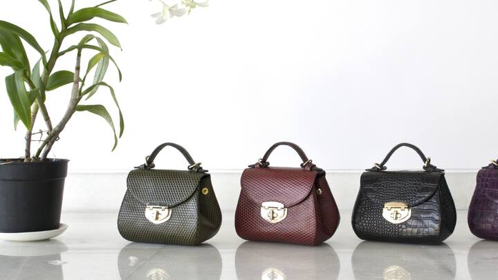 Embrace the Eco-Chic Movement. Selecting a vegan handbag is a stylish and eco-friendly approach to flaunt your personal sense of style. Choose from a variety of patterns,colors, and textures to get the perfect vegan bag to match any outfit or occasion. So, embrace the eco-chic revolution and show off in style while knowing that you're helping the environment. (Image source: Canva)